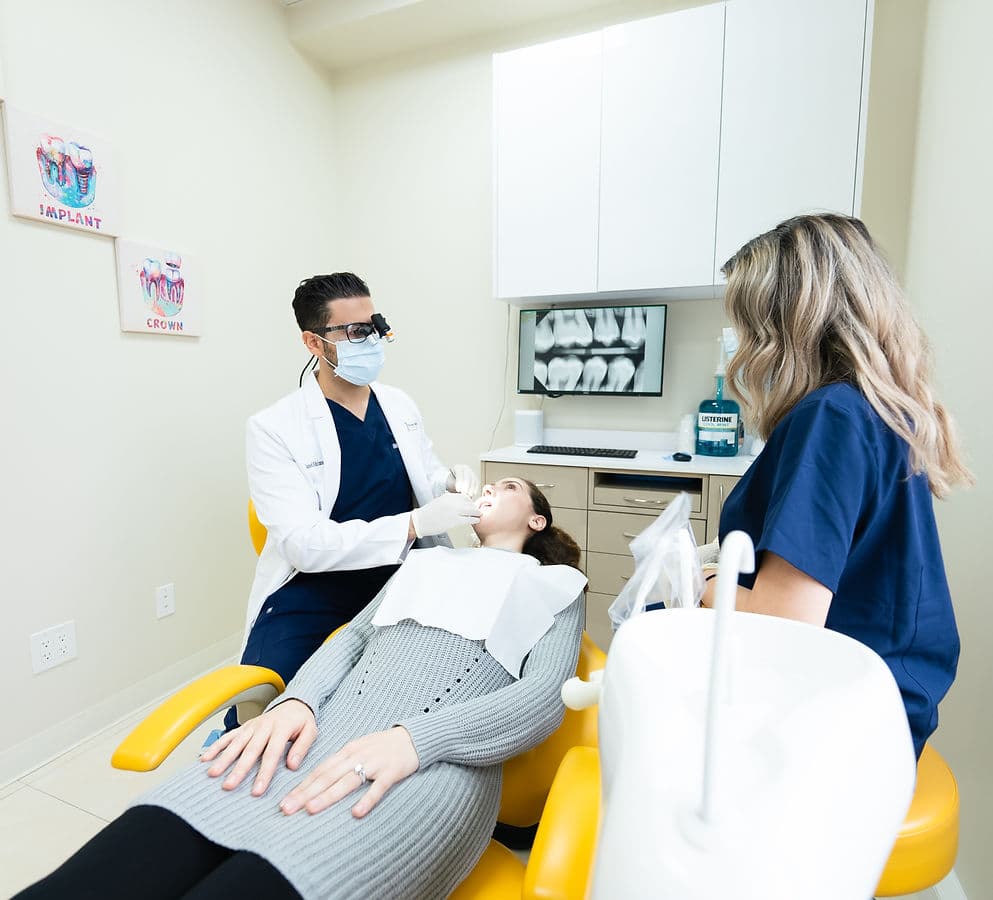 A patient in the chair at Dream Smile Dental during a teeth whitening visit